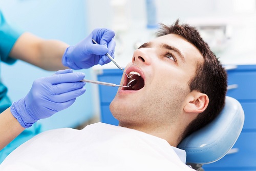 Lắp răng sứ bị sưng lợi phải xử lý ra sao?-2